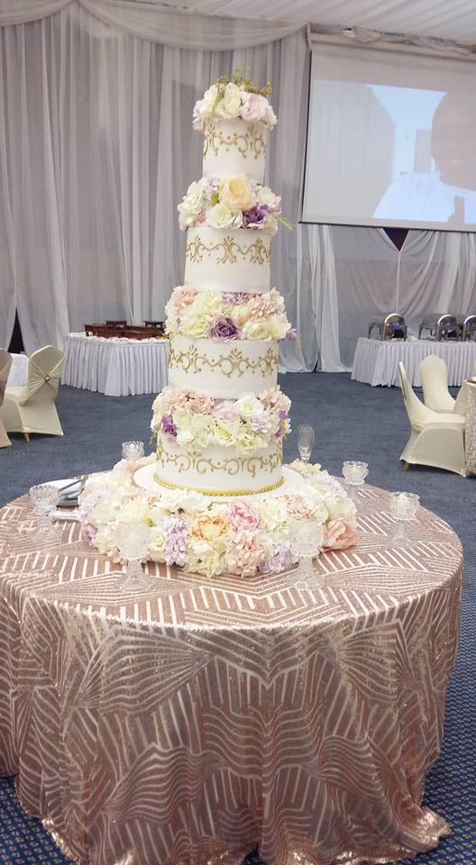 A five tier wedding cakes by Sarahs Cakes