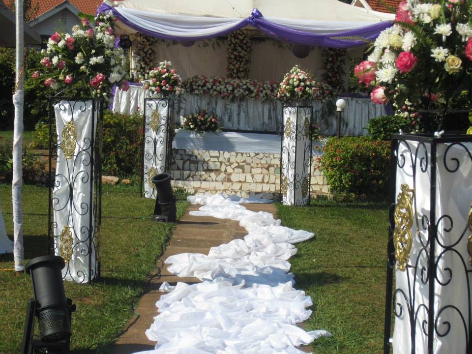 A bridal high table and walk way being set up at Bunga Leisure Gardens