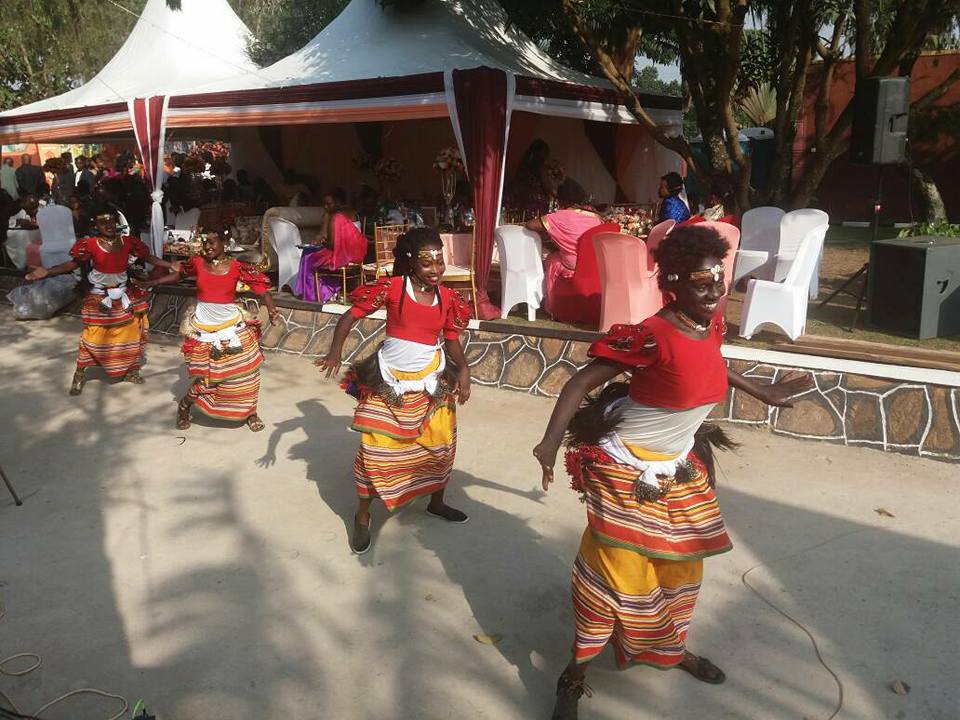 Ladies of the Nyange Cultural Performers group dance in excitement at Regina's introduction
