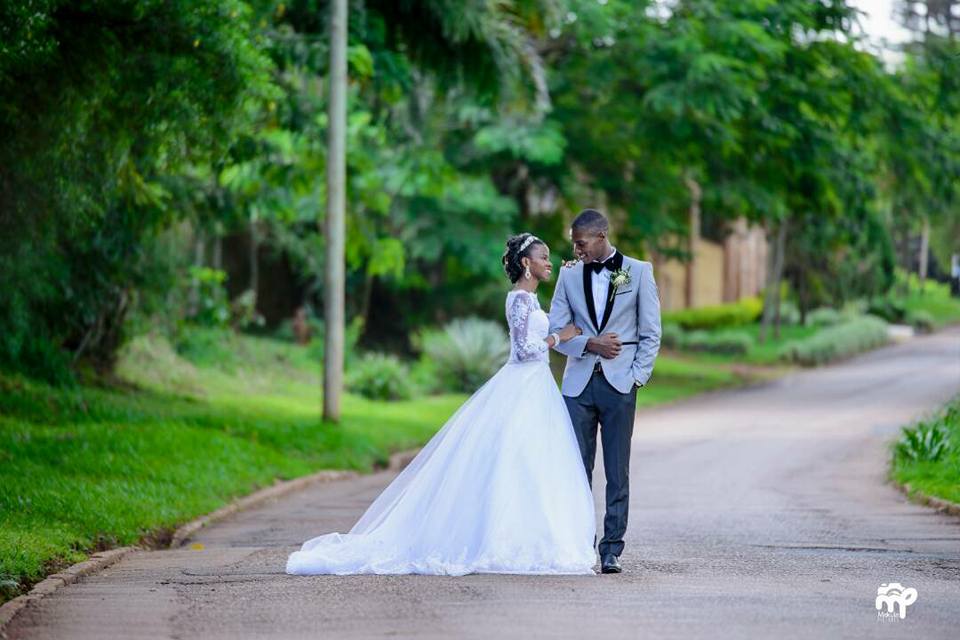 A Bride & Groom in a street photo shot powered by Makula Pictures
